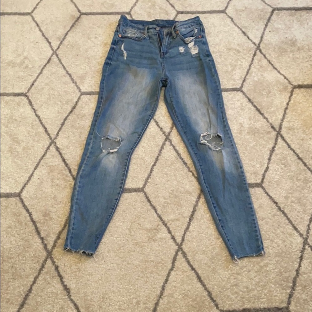 High-Waisted Ripped Jeans